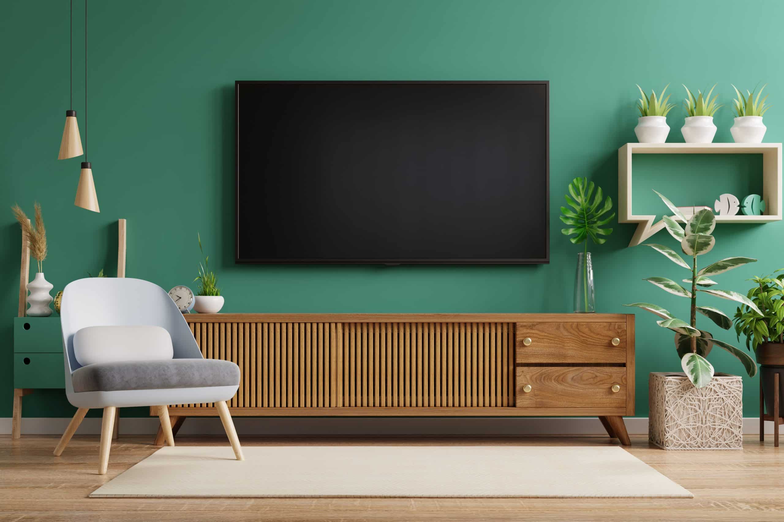 living room interior have tv cabinet and leather armchair with green wall 3d rendering scaled